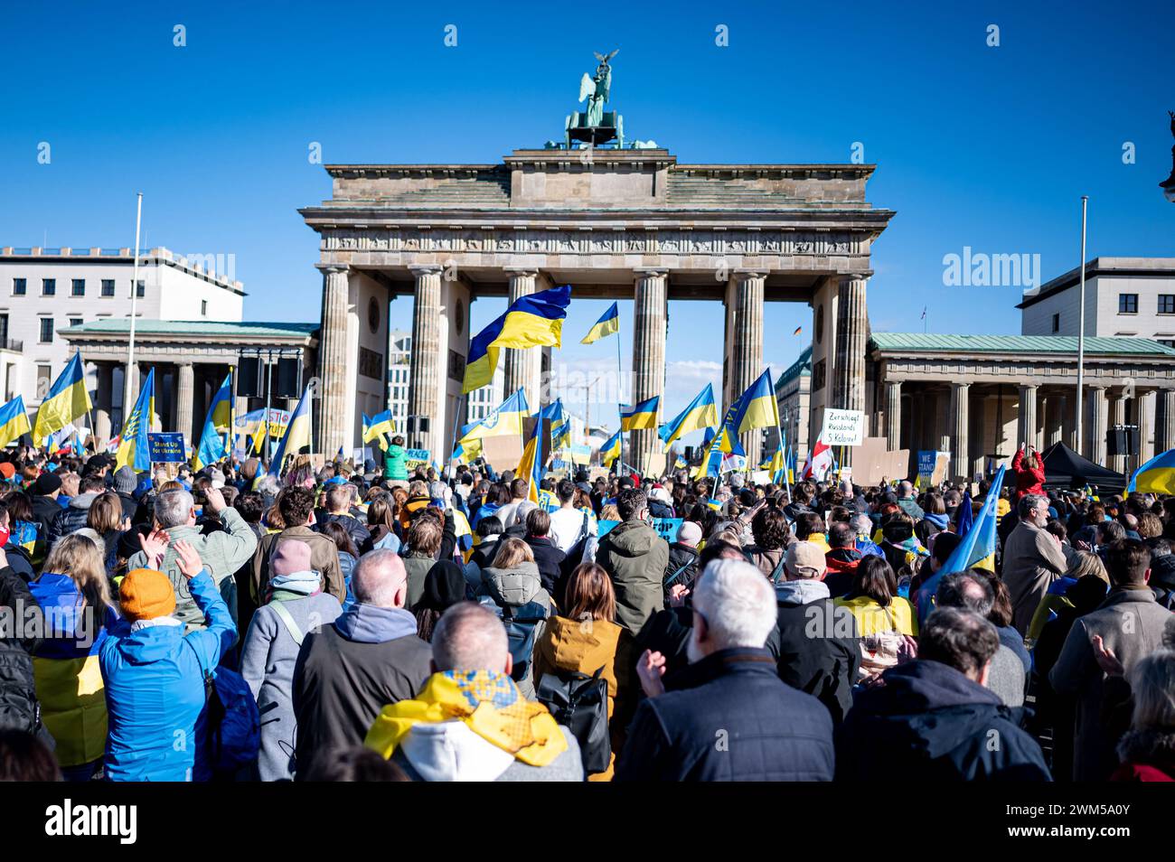 24 February 2024, Berlin: people take part in the solidarity demonstration organized by the Vitsche association 'Defending democracy together'. On the occasion of the second anniversary of the Russian war of aggression against Ukraine, actions and rallies in solidarity with Ukraine are taking place in many places in Germany. Photo: Fabian Sommer/dpa Stock Photo