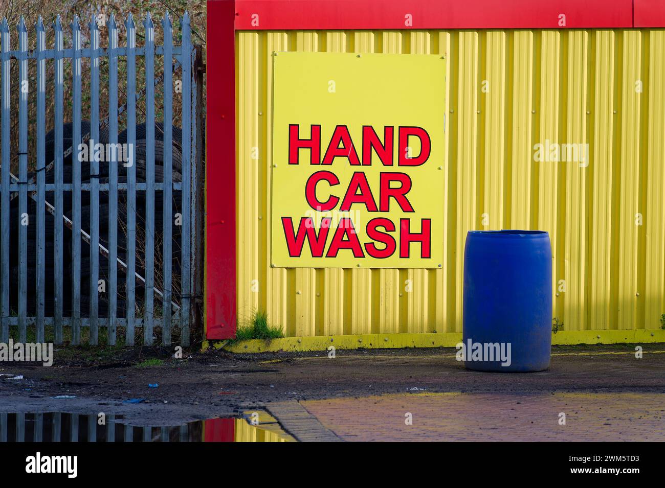 Hand car wash sign and water bucket ready for washing Stock Photo Alamy