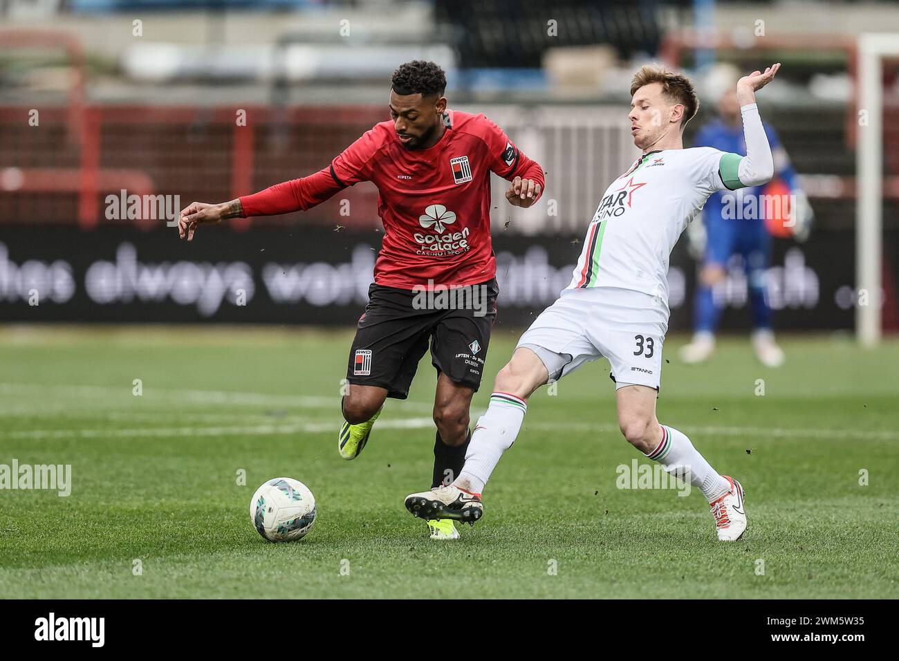 Brussels, Belgium. 24th Feb, 2024. Rwdm's Jeff ReineAdelaide and OHL's