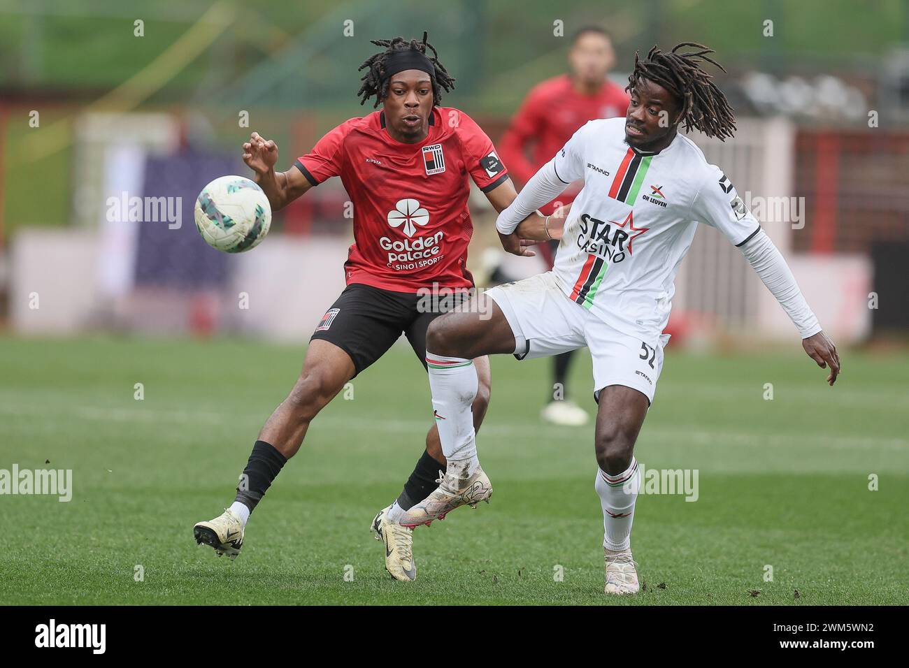 Brussels, Belgium. 24th Feb, 2024. Rwdm's Tayo Adaramola and OHL's