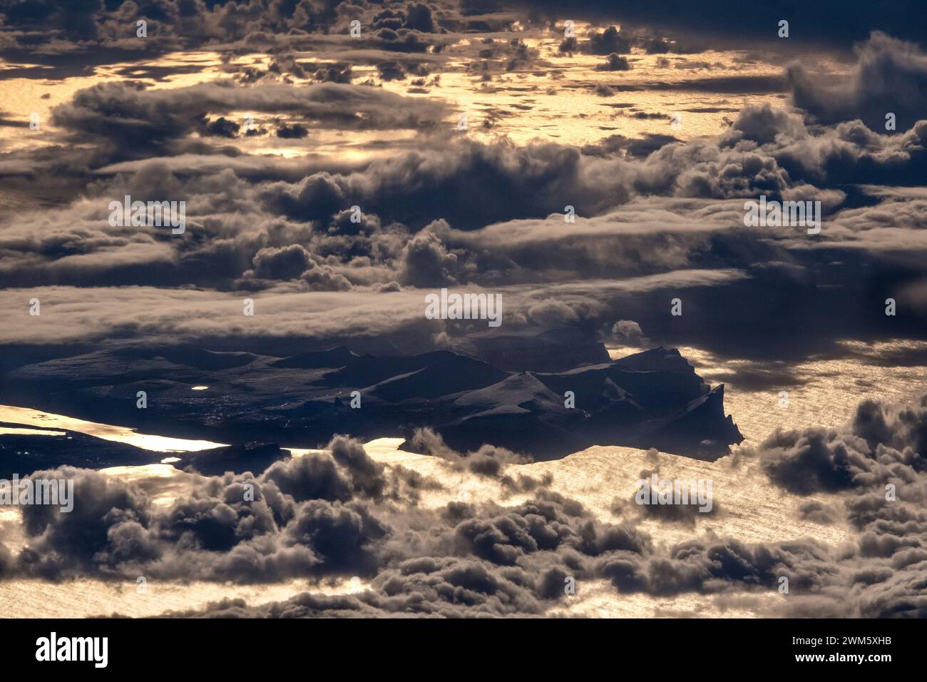 Faroe Islands, aerial view, islands peeking out from clouds Stock Photo