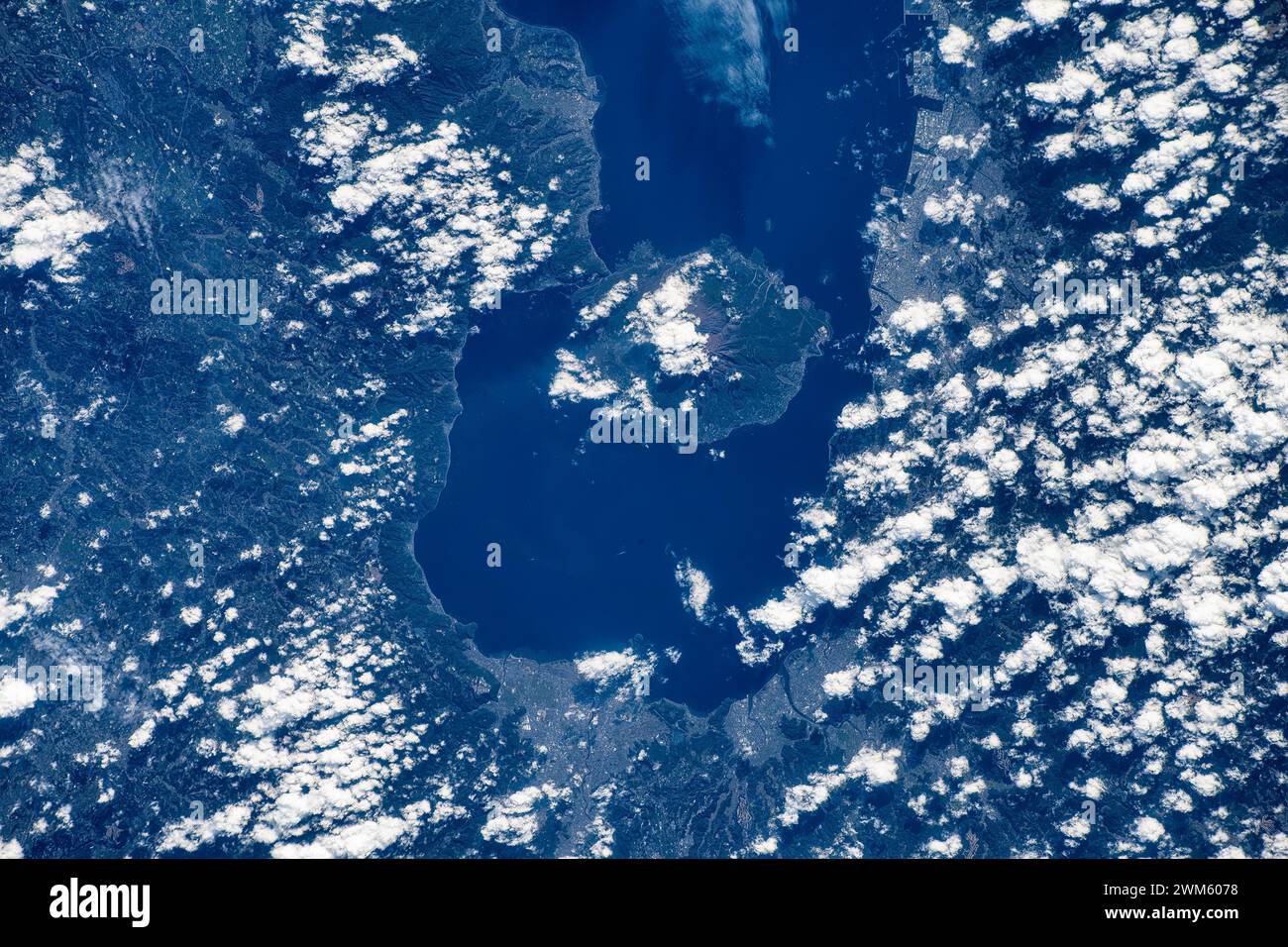 The coastline features close to Kagoshima, Japan. Digital enhancement of an image by NASA Stock Photo