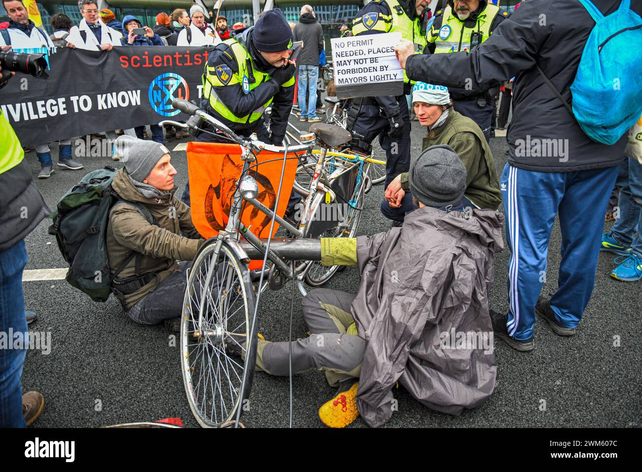 Amsterdam, The, Netherlands24th Feb, 2024. Extinction Rebellion activists blocked the A10 highway next to the former ING building. In a few hours the police arrested over a hundred people and cleared the road Credit: Pmvfoto/Alamy Live News Stock Photo