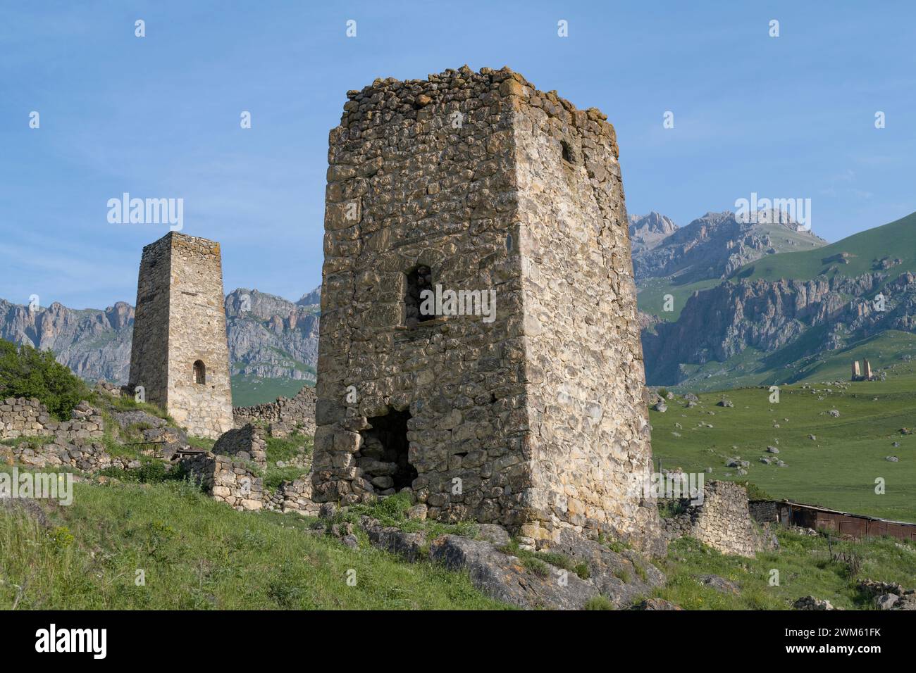 Ancient Ossetian defensive towers on a sunny June morning. Tsmiti, North Ossetia-Alania. Russian Federation Stock Photo