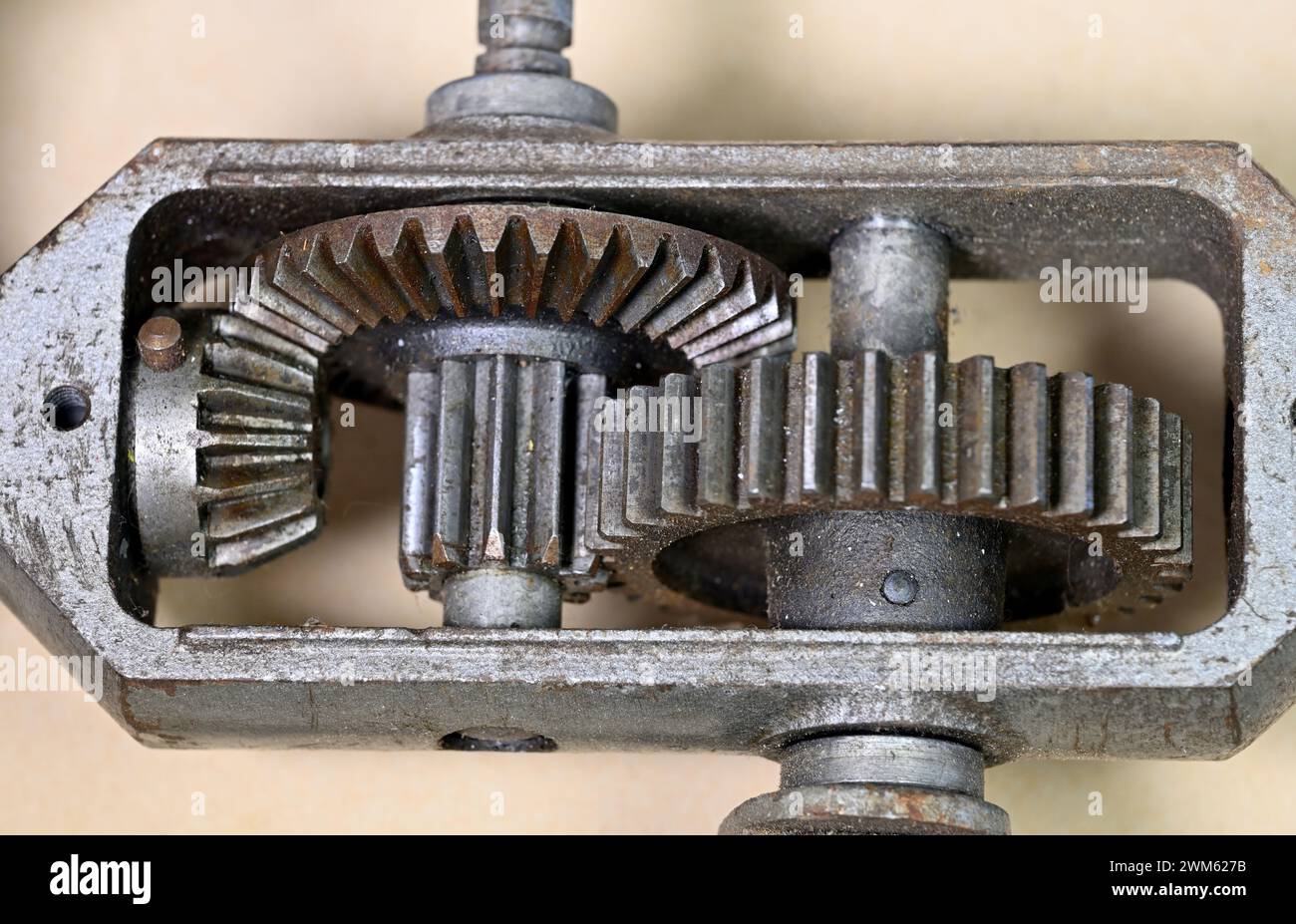 Gears and cogwheels to transmit power and change direction of rotation Stock Photo