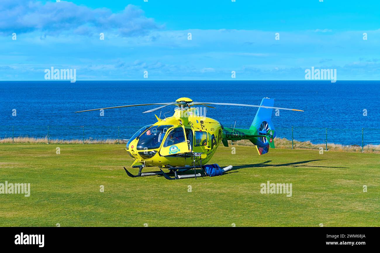 Scottish Air Ambulance the charity helicopter on grass Moray Coast ...
