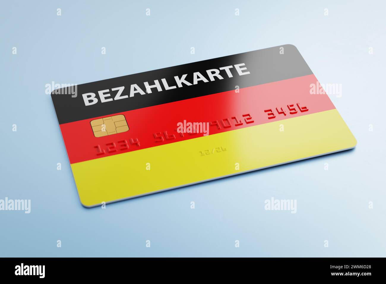 A debit card with the German flag and the label 'Bezahlkarte' (payment card) with fake number lying on a blue table. Germany is changing support payme Stock Photo