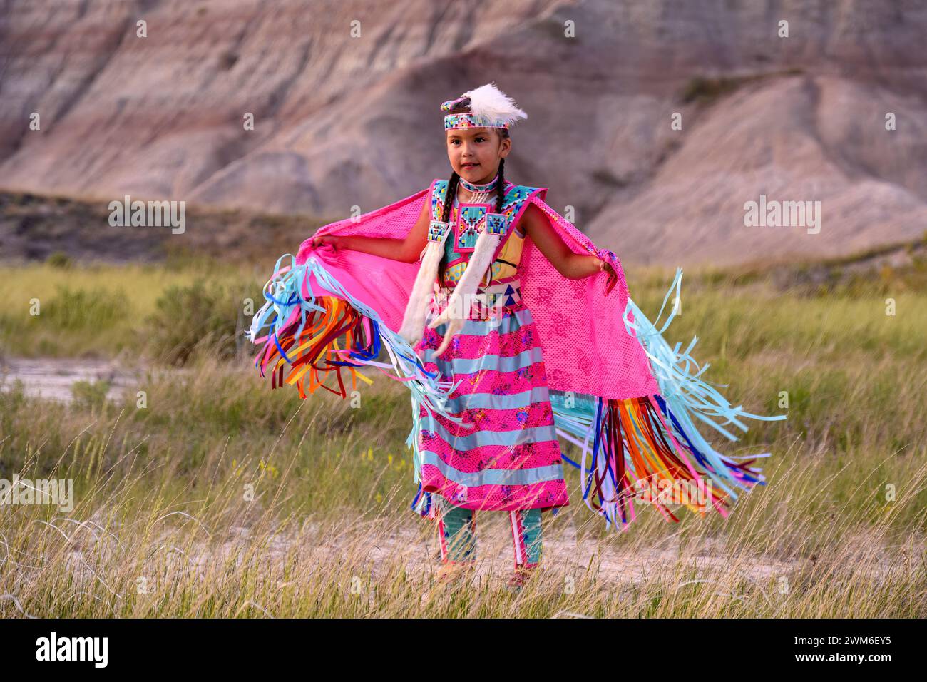 Letty Holy Bull, of the Sicangu Lakota Oyate tribe, performing her Shawl Dance in Badlands National Park, South Dakota. Stock Photo