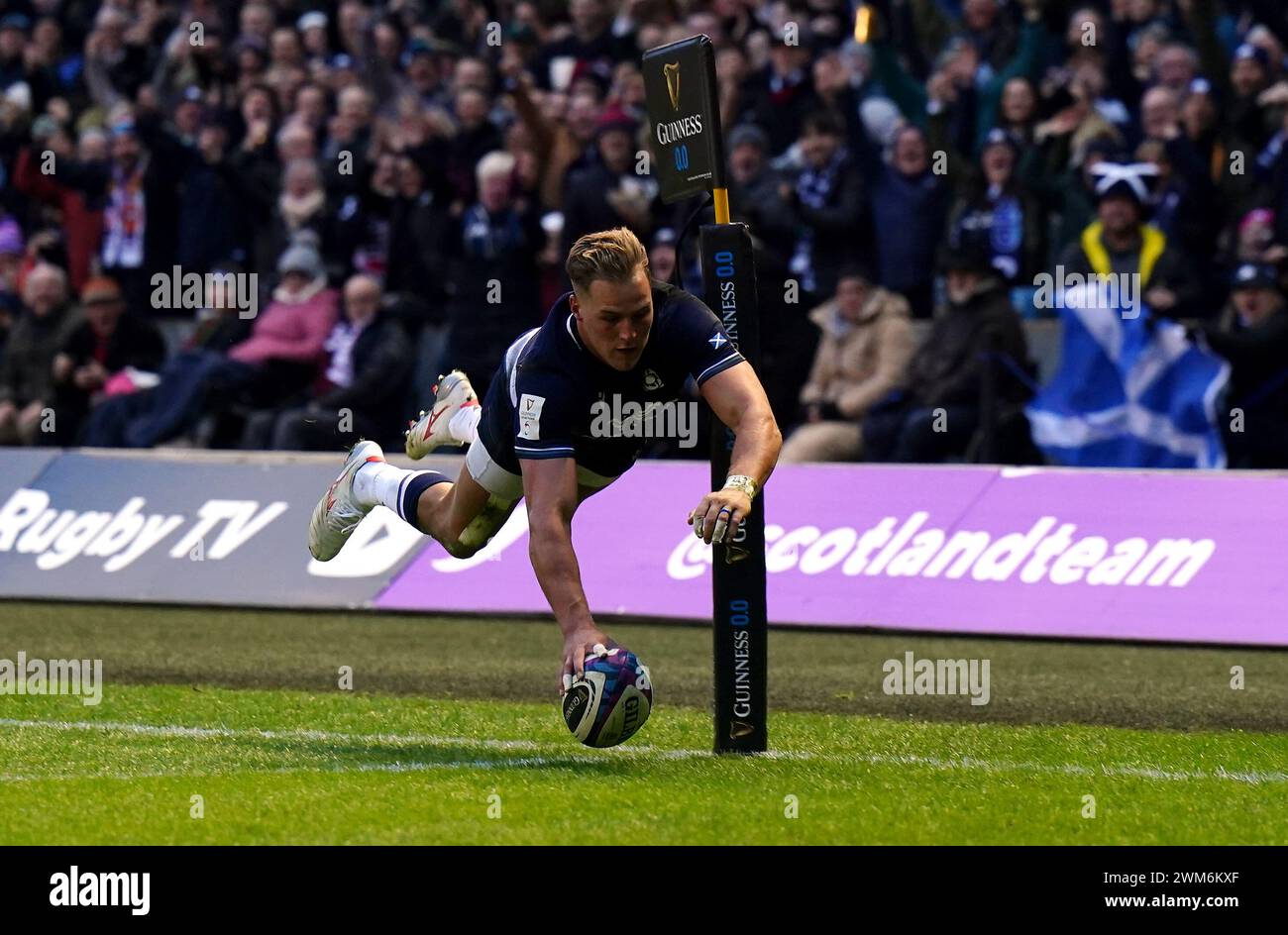 Scotland's Duhan van der Merwe scores their second try during the Guinness Six Nations match at the Scottish Gas Murrayfield Stadium, Edinburgh. Picture date: Saturday February 24, 2024. Stock Photo