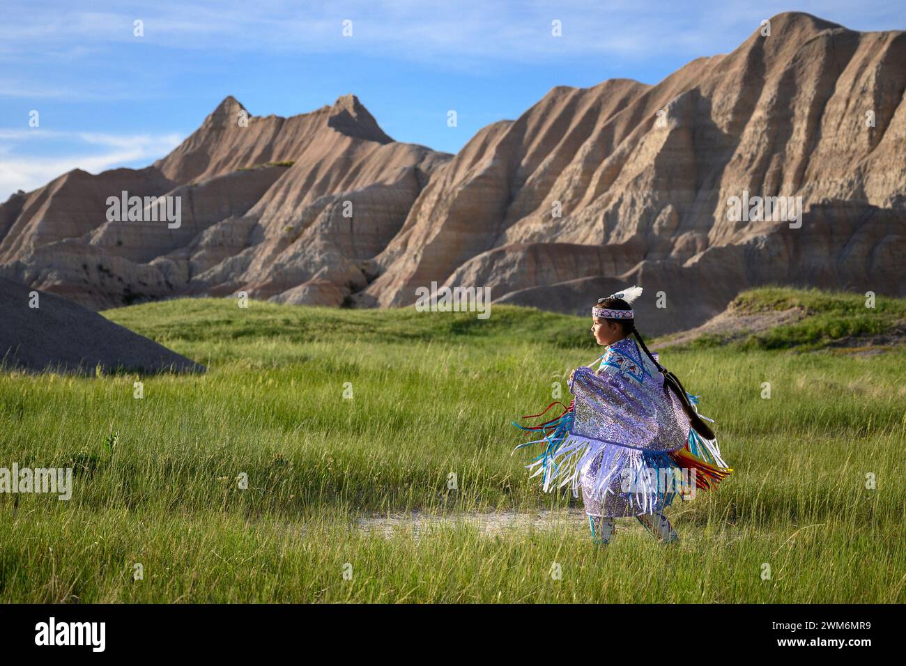 Letty Holy Bull from the Rosebud Sioux Indian Reservation performs a Shawl Dance in Badlands National Park, South Dakota Stock Photo