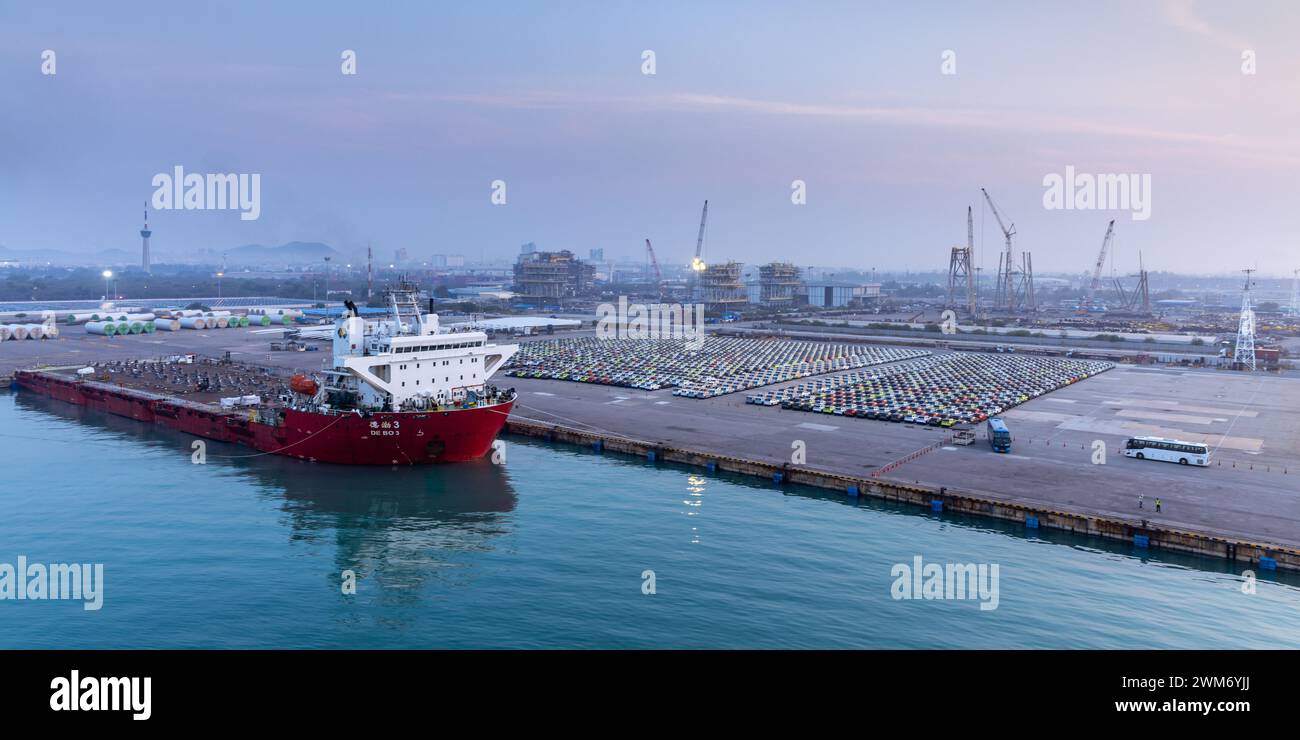 Container Cargo ship docked at the industrial port of Laem Chabang in Thailand Stock Photo