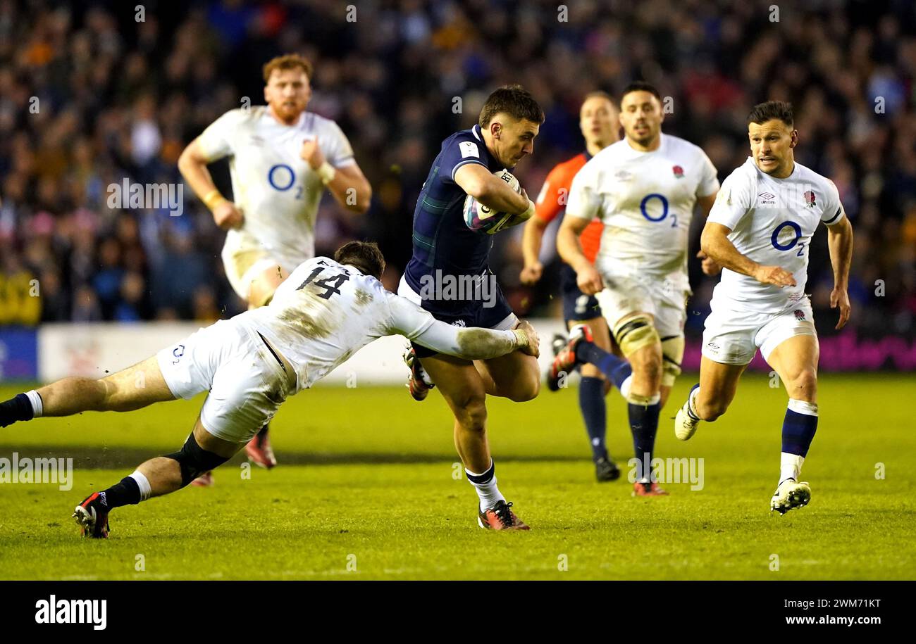Scotland's Cameron Redpath (centre) is tackled by England's Tommy ...