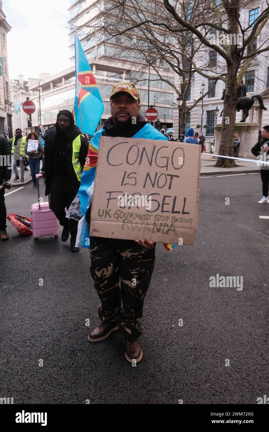 London, UK. 24th Feb, 2024. People hold posters and shout slogans as they participate in the Stand for DR Congo march in London, England on February 24, 2024. (Photo by Joao Daniel Pereira/Sipa USA) Credit: Sipa USA/Alamy Live News Stock Photo
