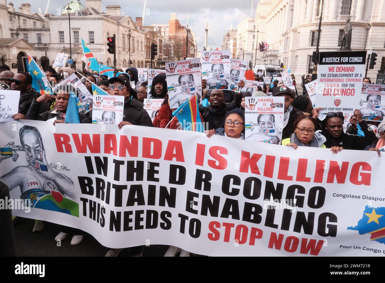 London, UK. 24th Feb, 2024. People hold posters and shout slogans as they participate in the Stand for DR Congo march in London, England on February 24, 2024. (Photo by Joao Daniel Pereira/Sipa USA) Credit: Sipa USA/Alamy Live News Stock Photo