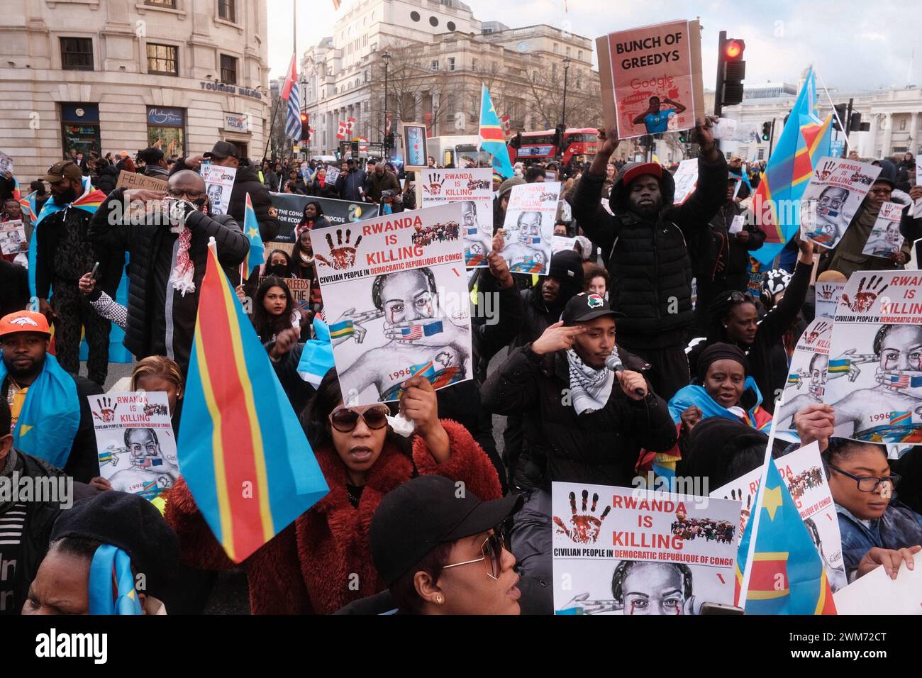 London, UK. 24th Feb, 2024. People hold posters and shout slogans as they participate in the Stand for DR Congo march in London, England on February 24, 2024. (Photo by Joao Daniel Pereira/Sipa USA) Credit: Sipa USA/Alamy Live News Stock Photo