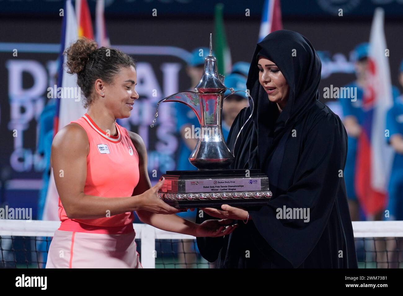 Jasmine Paolini of Italy receives her trophy from Sheikha Latifa bint ...