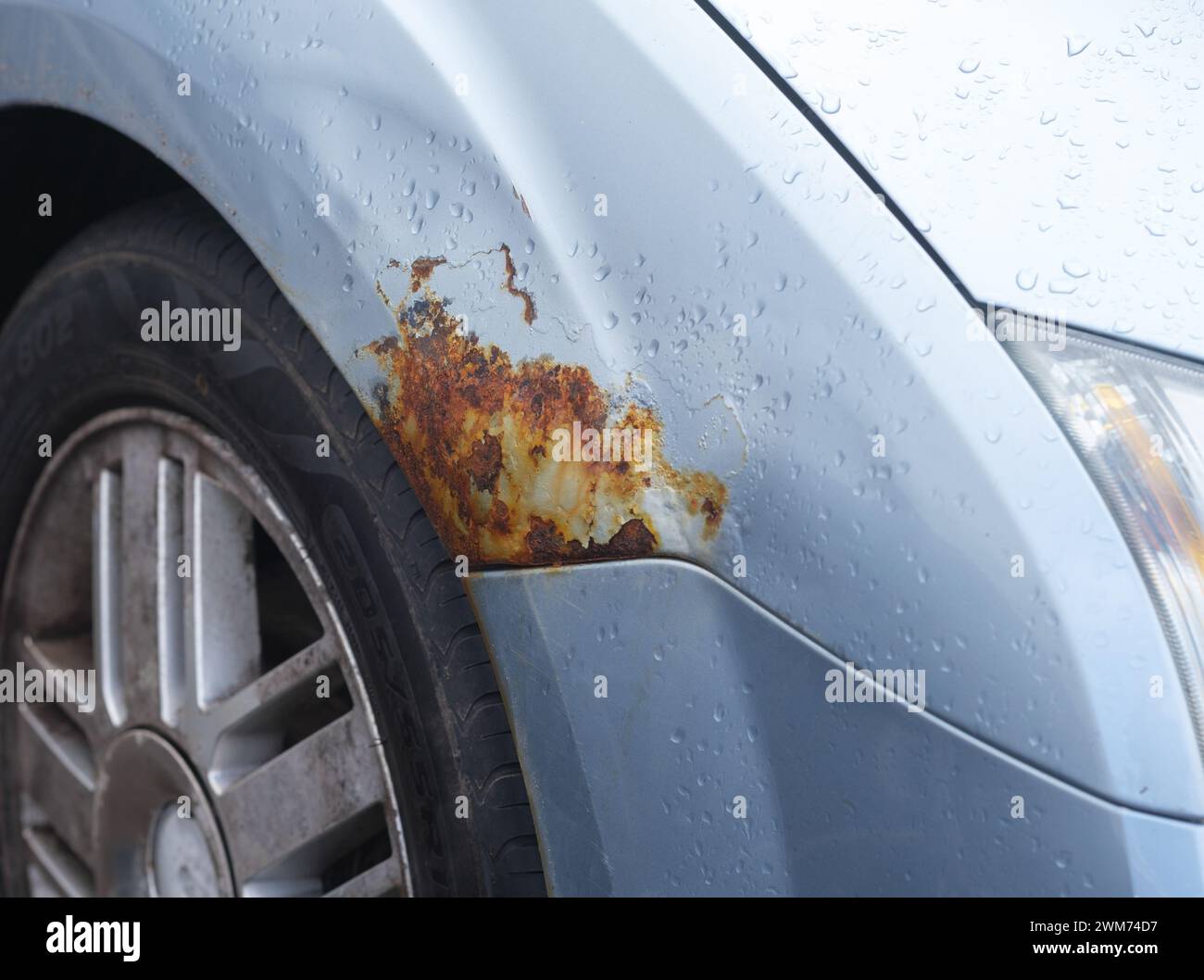 A Patch Of Rust Developing On The Wheel Arch Of A Moden Car Stock Photo