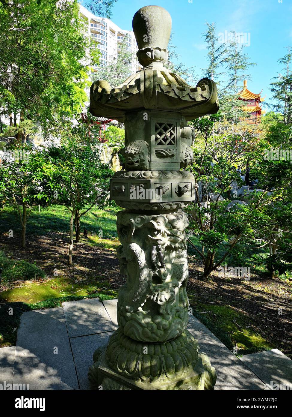 An Asianstyle lamp posts adorned with lion statues Sydney, Chinese Garden of Friendship Stock