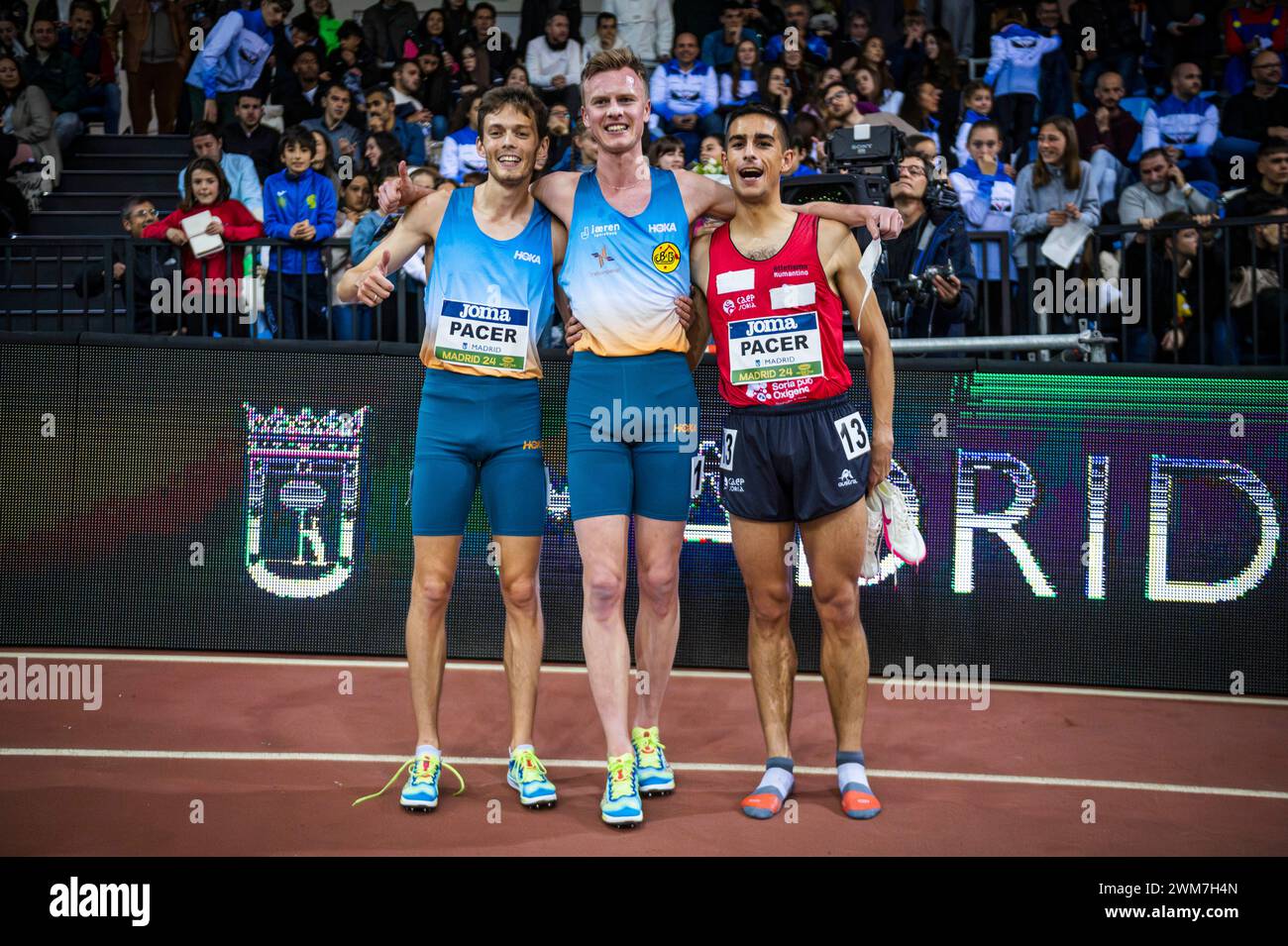 Madrid, Madrid, Spain. 23rd Feb, 2024. MADRID, SPAIN - FEBRUARY 23: Narve Gilje Nordas of Norway (C) between Jose Carlos Pinto of Portugal (L) and Miguel de la Torre of Spain (R) at the end of the the 3000m Men Final during the World Indoor Tour Gold Madrid on February 23, 2024 in Madrid, Spain. (Credit Image: © Alberto Gardin/ZUMA Press Wire) EDITORIAL USAGE ONLY! Not for Commercial USAGE! Stock Photo
