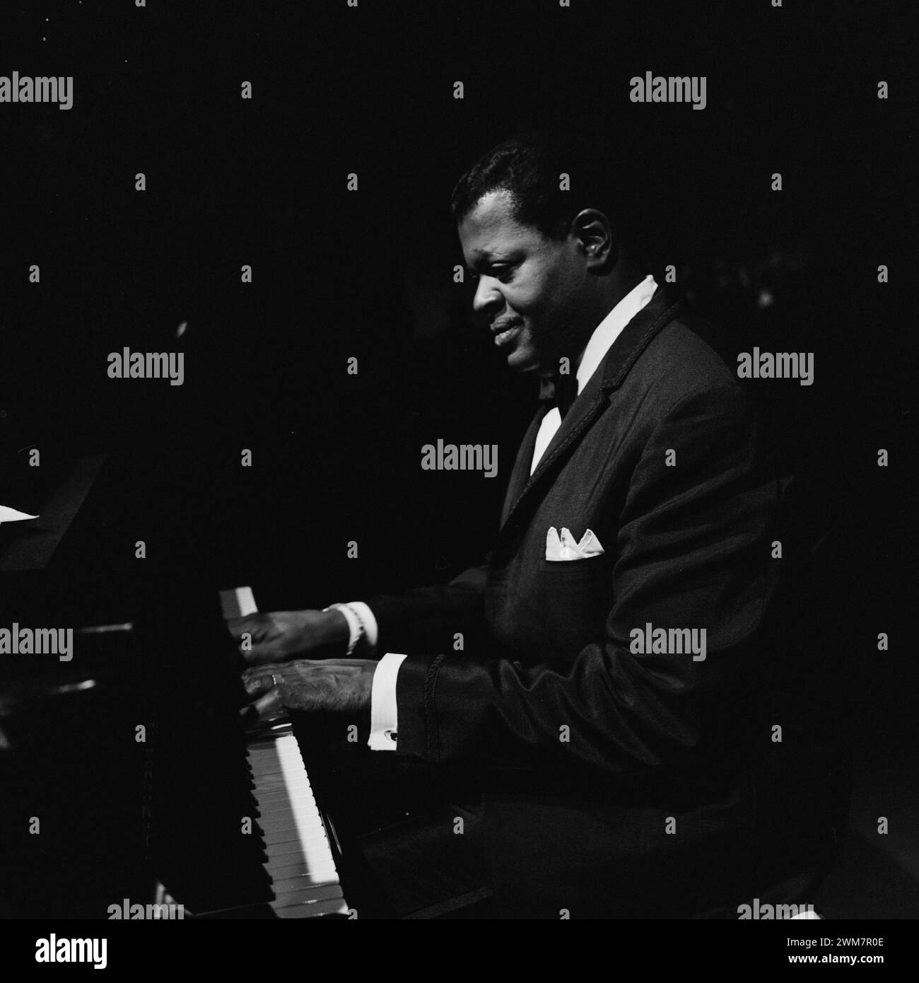 9 April, 1965. Amsterdam, Netherlands. Portrait of Canadian Pianist Oscar Peterson, playing the piano in concert, Stock Photo