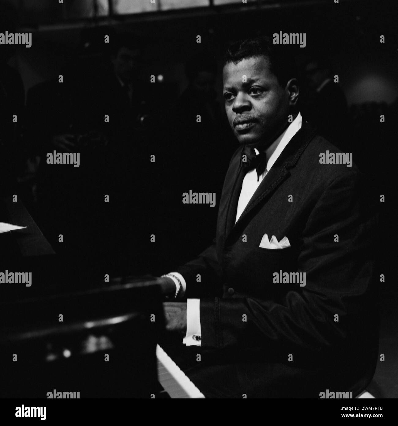 9 April, 1965. Amsterdam, Netherlands. Portrait of Canadian Pianist Oscar Peterson, playing the piano in concert, Stock Photo
