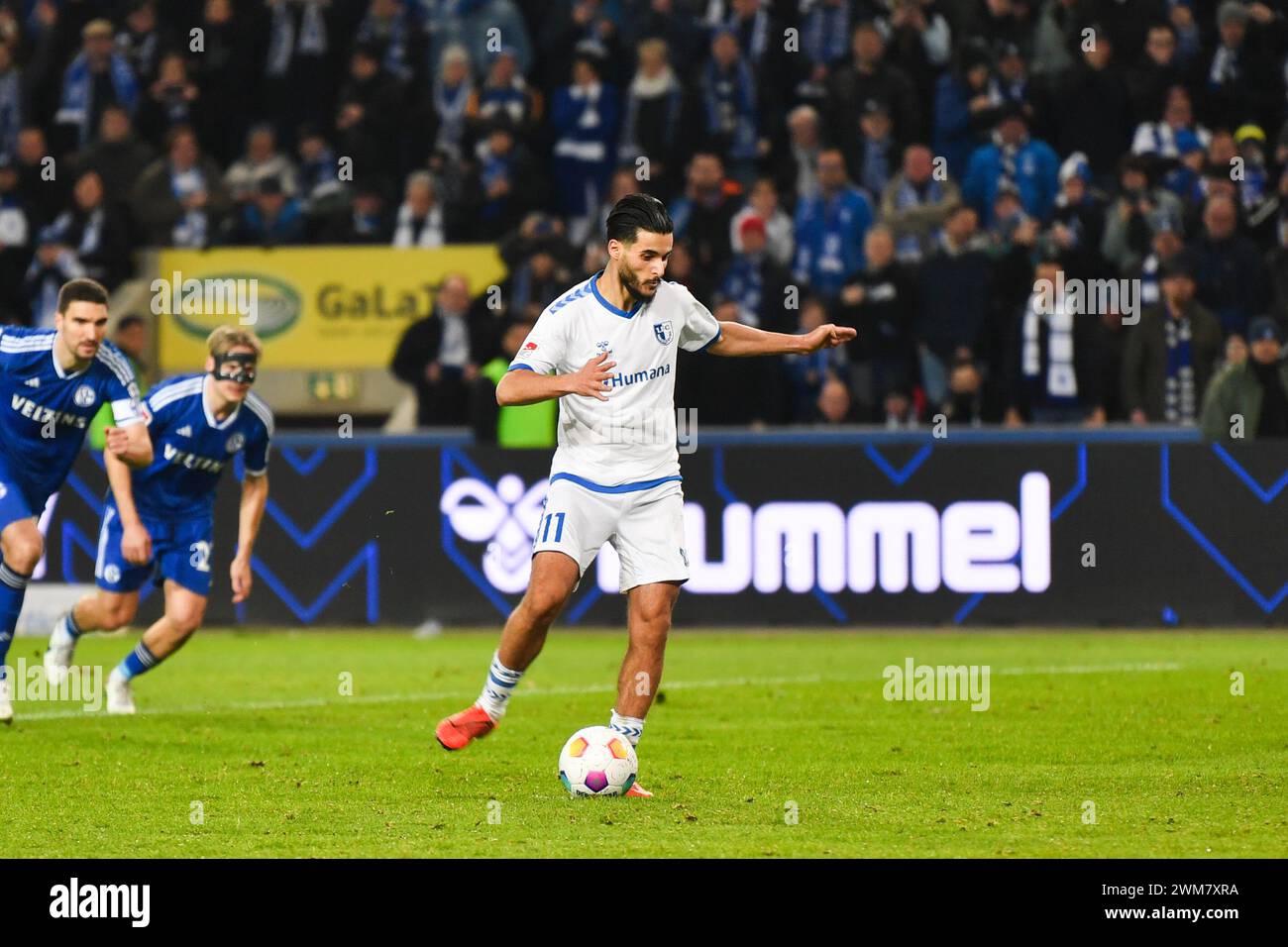 Magdeburg, Germany. 24th Feb, 2024. Soccer: Bundesliga 2, Matchday 23, 1. FC Magdeburg - FC Schalke 04, MDCC-Arena. Magdeburg's Mohammed El Hankouri scores from the penalty spot to make it 2-0. Credit: Christophe Gateau/dpa - IMPORTANT NOTE: In accordance with the regulations of the DFL German Football League and the DFB German Football Association, it is prohibited to utilize or have utilized photographs taken in the stadium and/or of the match in the form of sequential images and/or video-like photo series./dpa/Alamy Live News Stock Photo