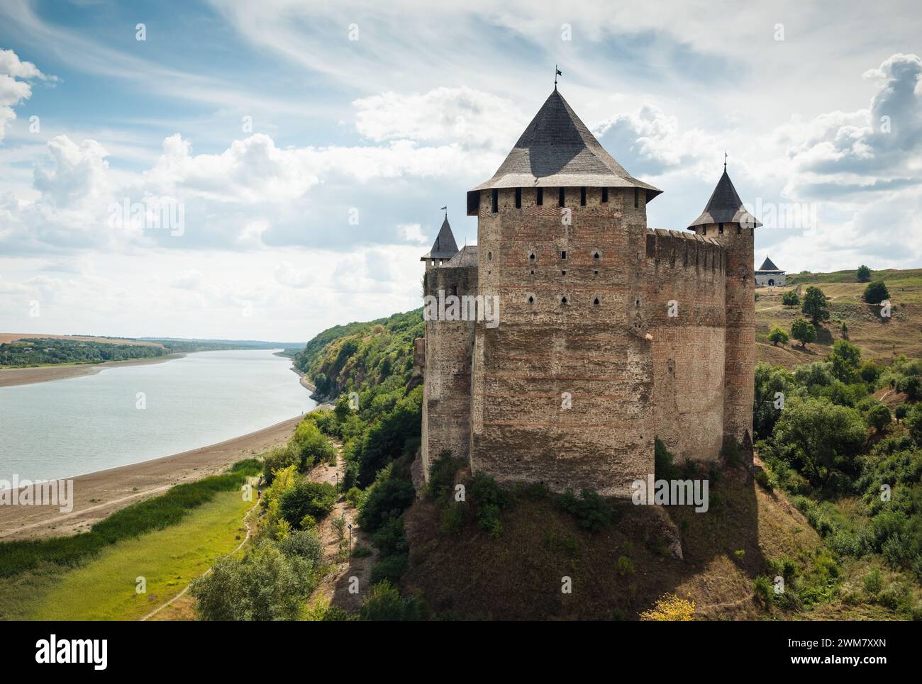 Khotyn fortress on the bank of Dniester river. Castle tower on a sunny day Stock Photo