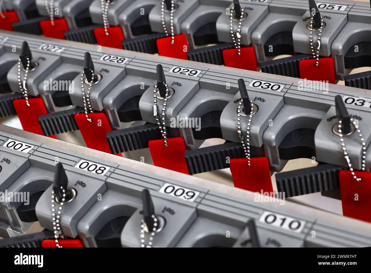 Umbrella stand locks and keys lined up in an orderly manner Stock Photo