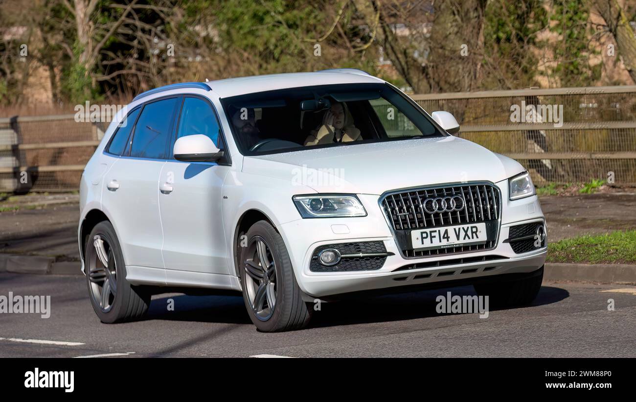 Milton Keynes,UK-Feb 24th 2024: 2015 white diesel engine Audi Q5  car driving on an English road Stock Photo