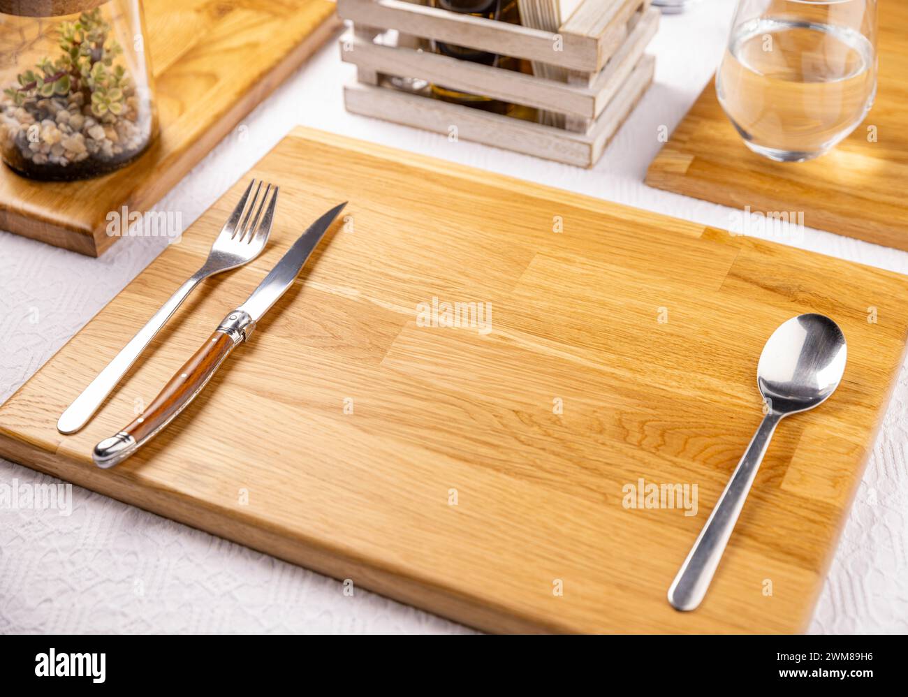 Set of cutlery knife, spoon and fork. Modern table setting on