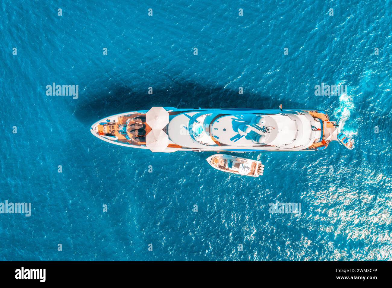 Aerial view of beautiful luxury yacht and boat in blue sea Stock Photo ...
