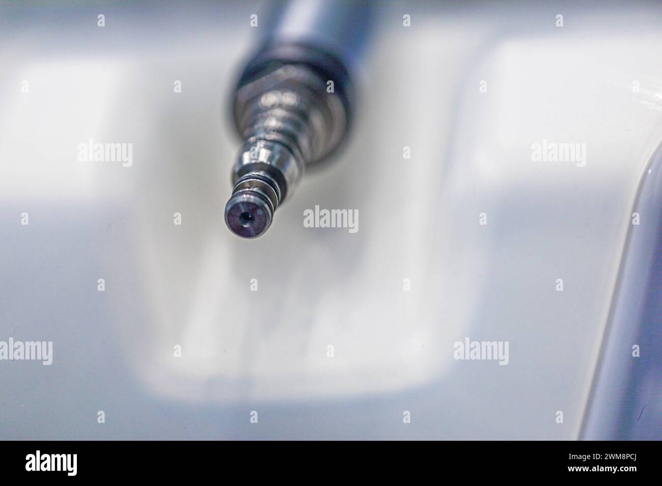 closeup of a dental bur machine attachment. Treatment and restoration