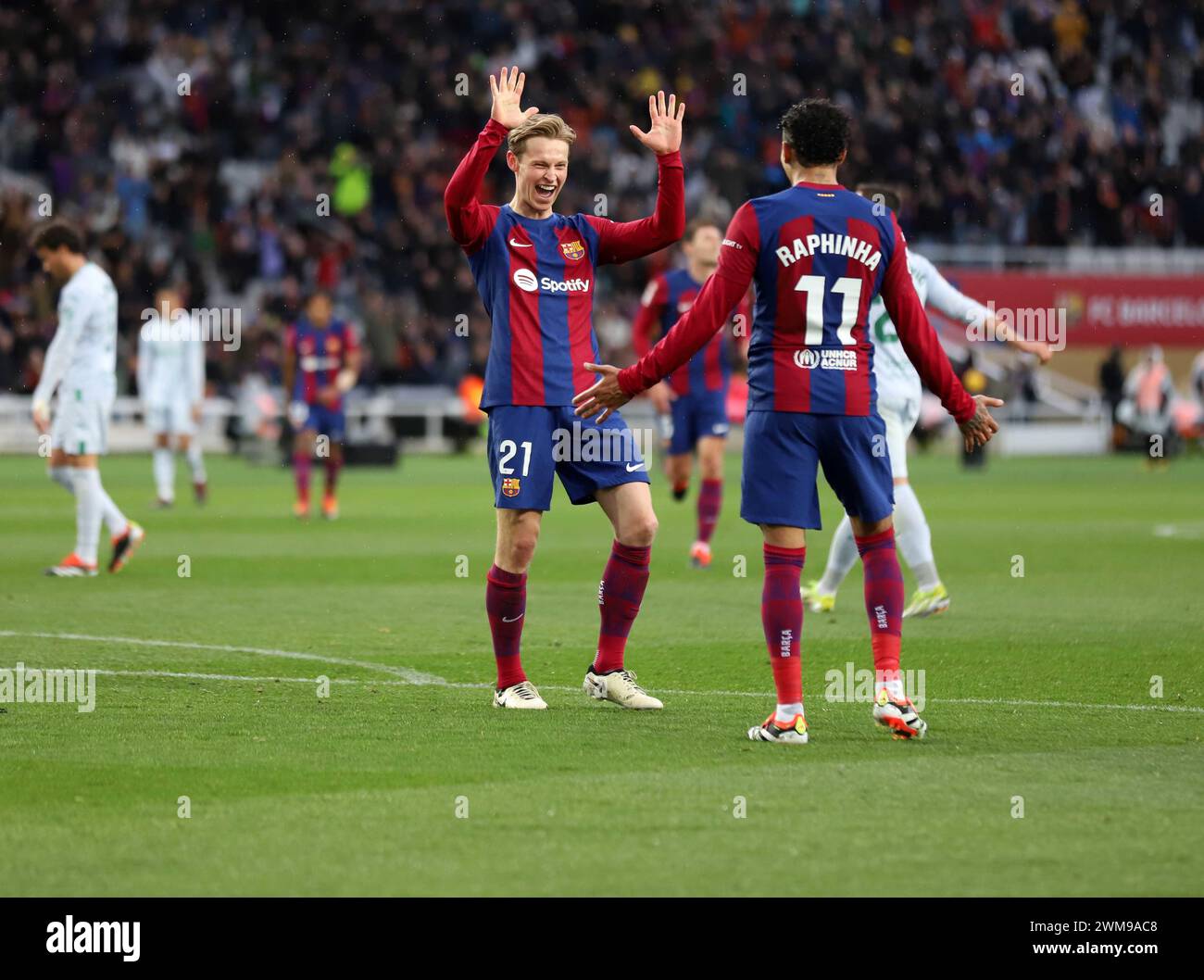 Sabadell, Barcelona, Spain. 24th Feb, 2024. Barcelona Spain 24.02.2024 Raphinha (FC Barcelona) and Frenkie de Jong (FC Barcelona) celebrate after scoring their team's third goal during the La Liga EA Sports between FC Barcelona and Getafe CF at Estadi Olimpic Lluis Companys on 24 February 2024 in Barcelona. (Credit Image: © Xavi Urgeles/ZUMA Press Wire) EDITORIAL USAGE ONLY! Not for Commercial USAGE! Credit: ZUMA Press, Inc./Alamy Live News Stock Photo