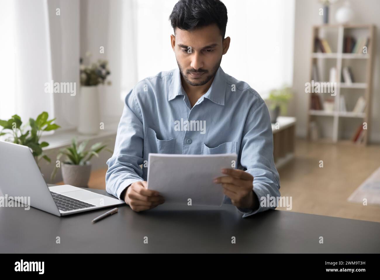 Serious indian man hi-res stock photography and images - Alamy