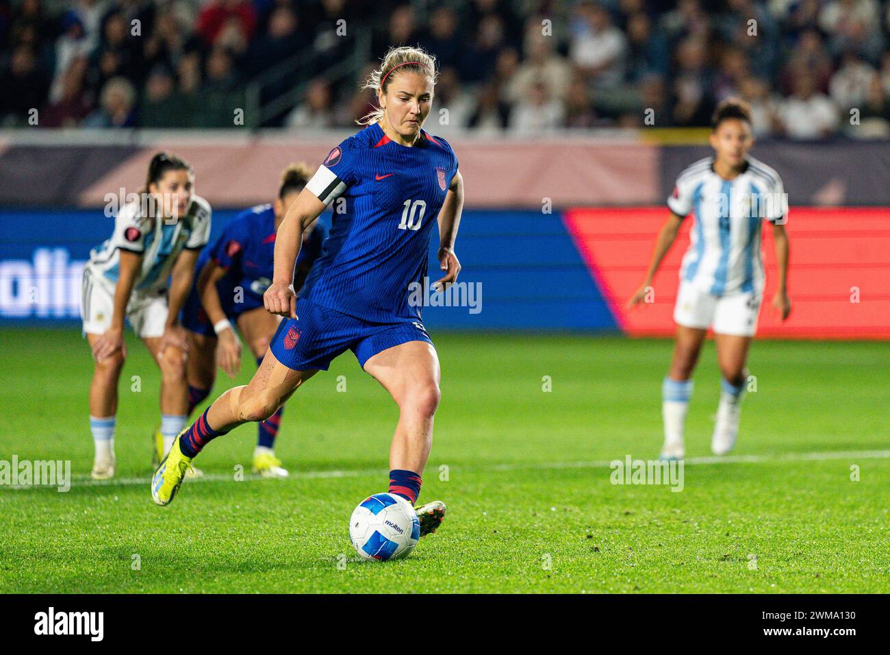 United States midfielder Lindsey Horan (10) scores on a penalty kick during the Concacaf W Gold Cup Group A match against Argentina, Friday, February Stock Photo