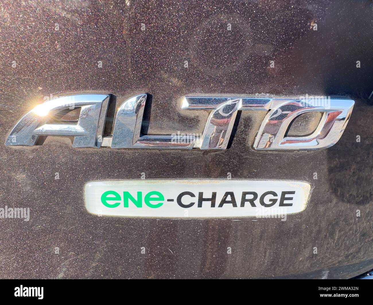 Close up view of Suzuki Alto ENE-Charge logo: Swat, Pakistan - 01 January 2024. Stock Photo