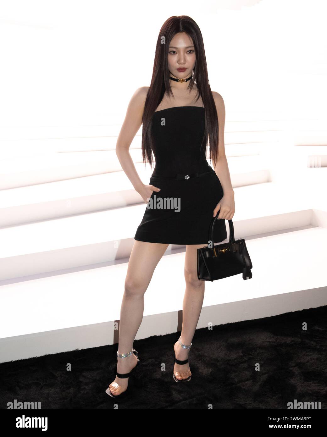 ningning black dress Ningning of aespa arrives at her first ever Met Gala in a custom black Gucci ball gown adorned with sculptural floral details, paired with Gucci shoes and Bvlgari jewellery. #metgala #ningning #gucci #