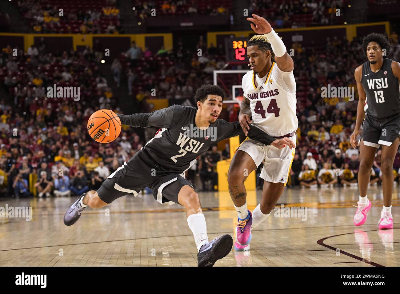 Washington State Cougars guard Myles Rice (2) drives toward the basket in the second half of the NCAA basketball game against Arizona State in Tempe, Stock Photo