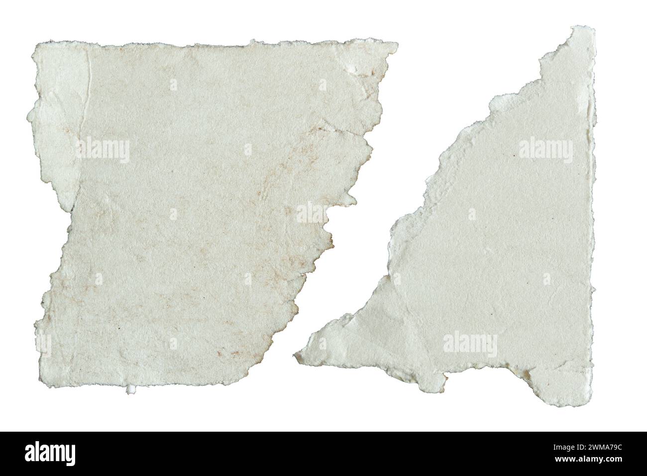 Torn old trapezoid and triangle shaped white papers with jagged edges on white background with clipping path Stock Photo