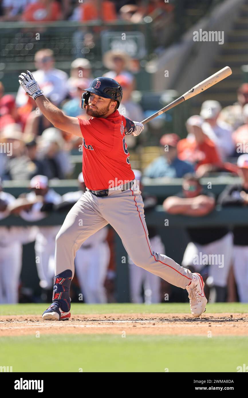 Sarasota FL USA; Boston Red Sox designated hitter Nathan Hickey (90) singles to left field during an MLB spring training game against the Baltimore Or Stock Photo
