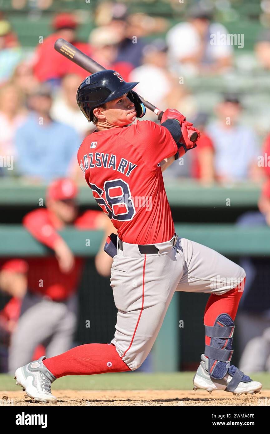 Sarasota FL USA; Boston Red Sox catcher Mark Kolozsvary (68) singles to center field during an MLB spring training game against the Baltimore Orioles Stock Photo