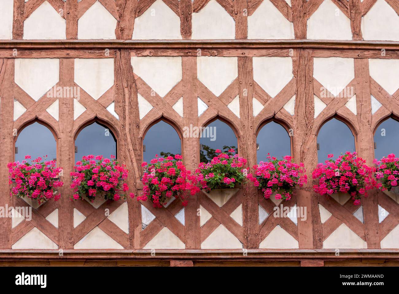 Half-timbered facade with floral decoration, Guingamp, Brittany, France Stock Photo