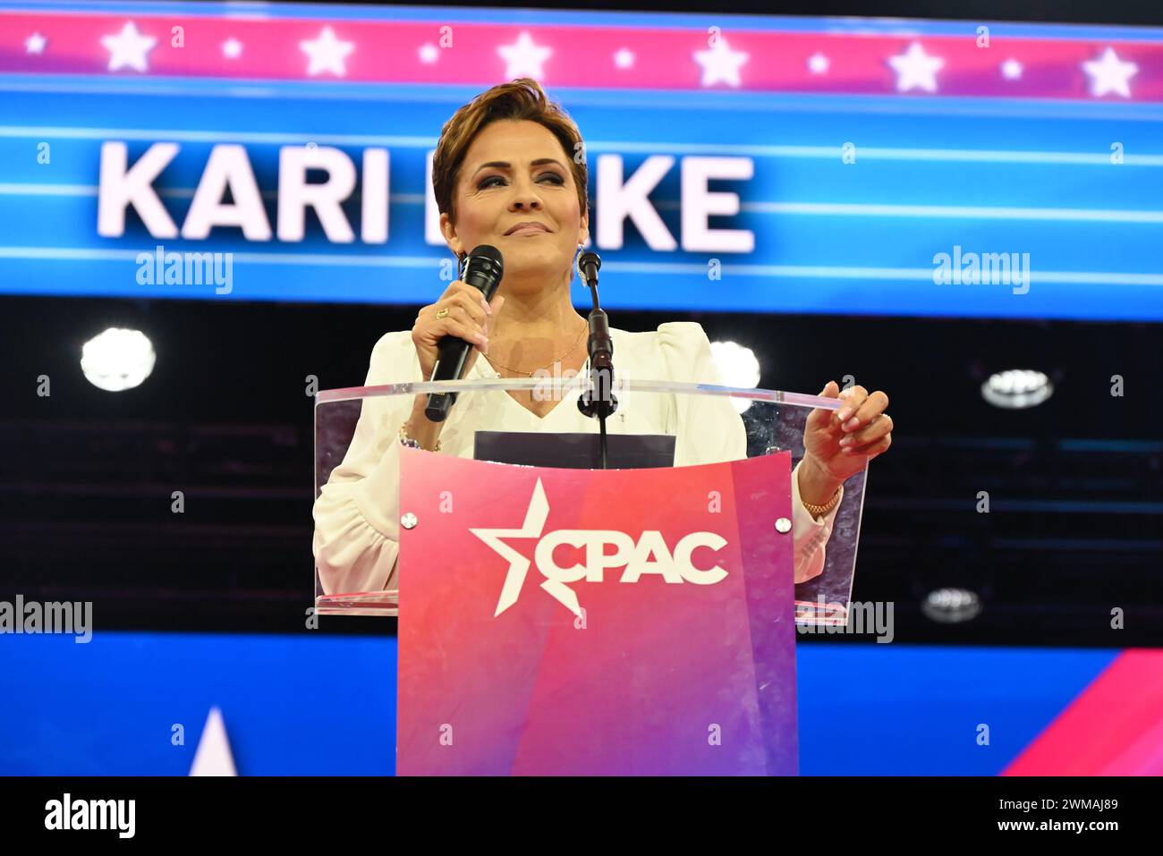 National Harbor, Maryland, USA. 24th Feb, 2024. KARI LAKE, 54, delivers remarks at the Conservative Political Action Conference, Saturday afternoon. Kari Lake Halperin is an American former television news anchor. A member of the Republican Party, she is a candidate in the 2024 United States Senate election in Arizona. She was also the Republican nominee in the 2022 Arizona gubernatorial election. Credit: ZUMA Press, Inc./Alamy Live News Stock Photo