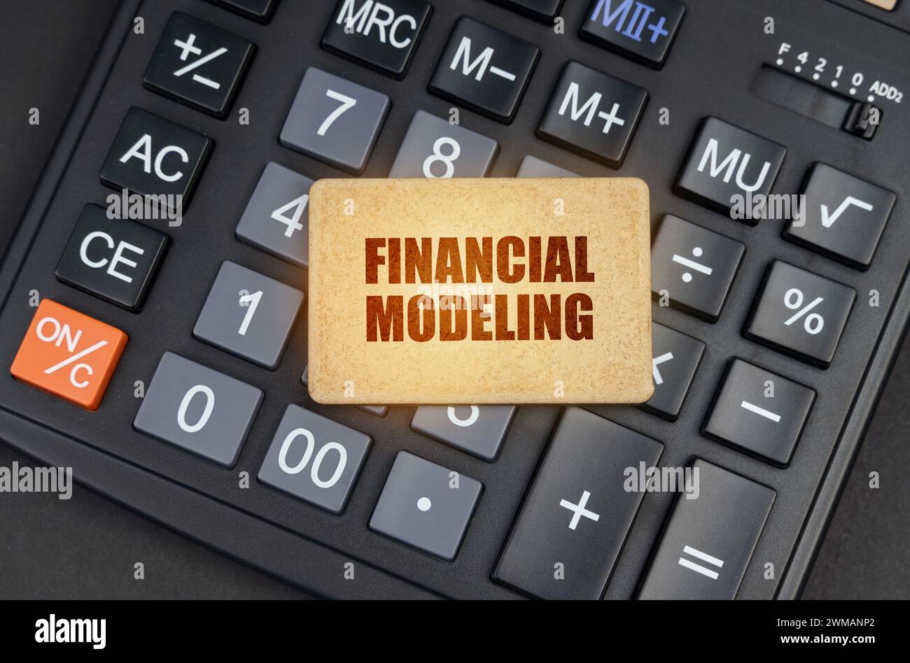 Financial concept. There is a sign on the calculator that says - Financial modeling Stock Photo