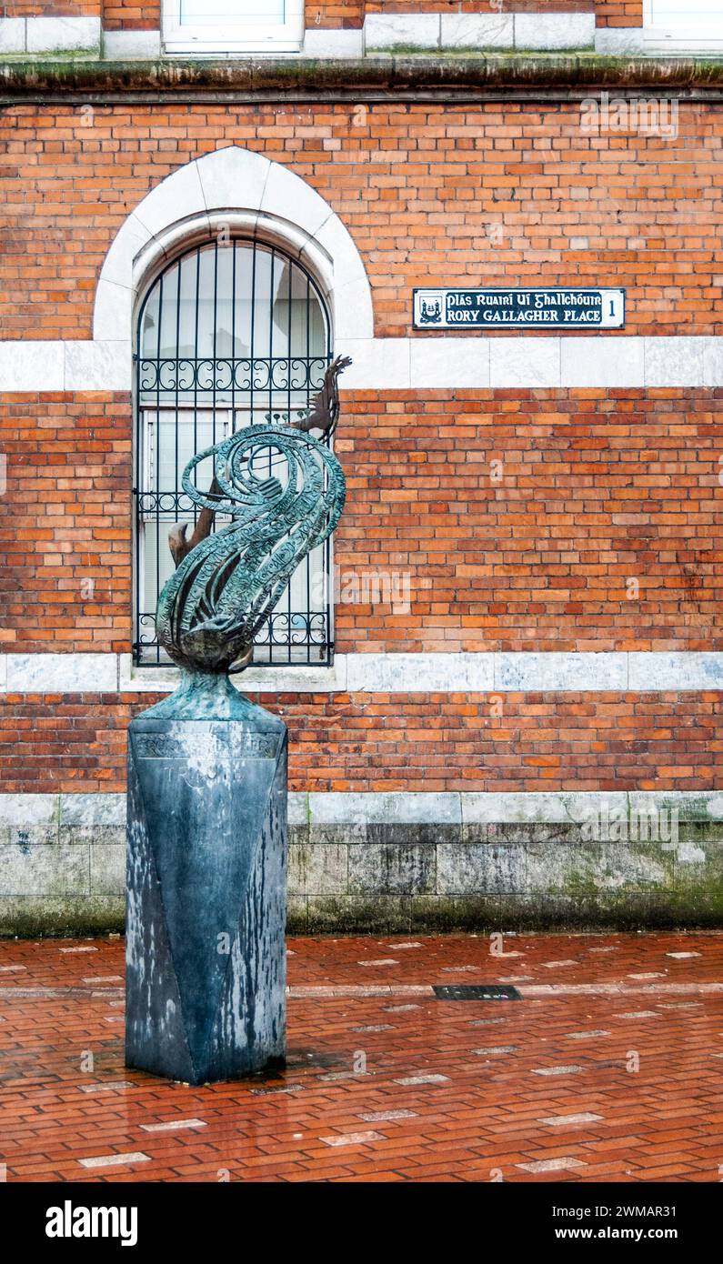 Rory Gallagher Monument by Geraldine Creedon, in Rory Gallagher Place in Cork, Ireland, with a sculpture in honor of the Irish blues and rock musician Stock Photo