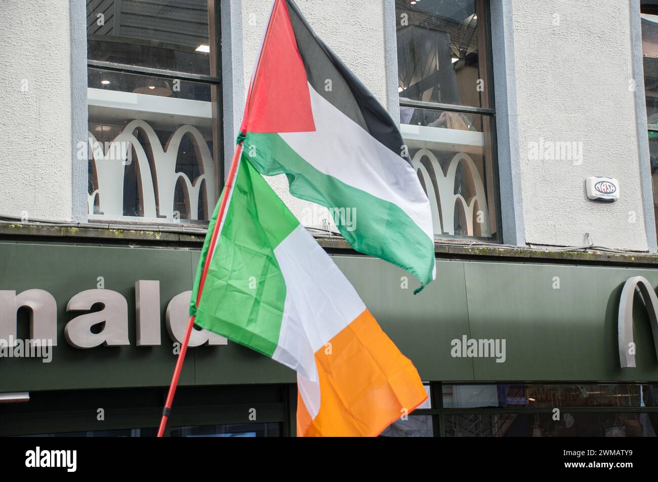 Cork City, Ireland. 24th February, 2024. In a striking act of solidarity, a vibrant crowd of protesters has filled the streets of Cork today, standing together in a united front for the people of Palestine. Credit: Karlis Dzjamko/Alamy Live News Stock Photo