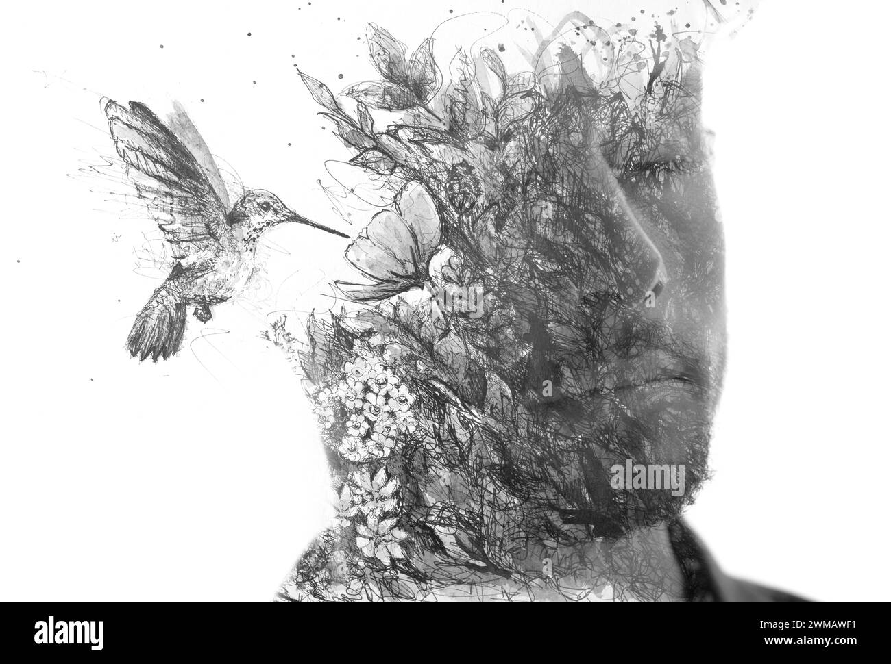 A double exposure paintography portrait of a man with a calibri bird Stock Photo