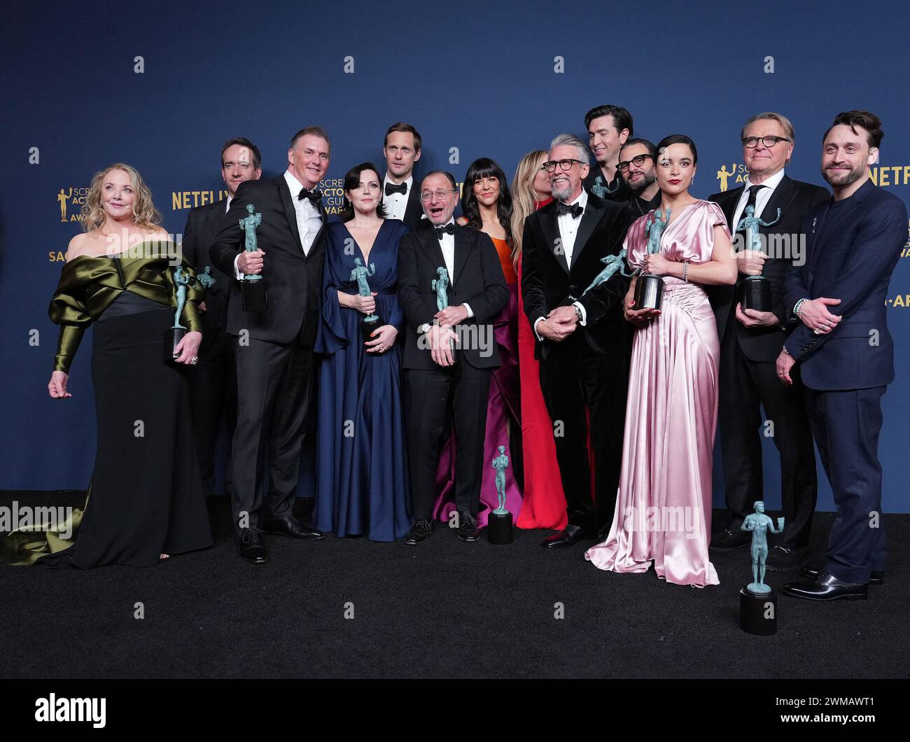 Los Angeles, USA. 24th Feb, 2024. Matthew Macfadyen, Alexander Skarsgård, Kieran Culkin, Nicholas Braun, J. Smith-Cameron, Scott Nicholson, Zoe Winters, Dagmara Dominczyk, Arian Moayed, Fisher Stevens, Alan Ruck, Juliana Canfield, David Rasche and Justine Lupe, Outstanding Performance by an Ensemble in a Drama Series the cast of 'Succession' pose in the press room held at The Shrine Auditorium and Expo Hall in Los Angeles, CA on Saturday, ?February 24, 2024. (Photo By Sthanlee B. Mirador/Sipa USA) Credit: Sipa USA/Alamy Live News Stock Photo