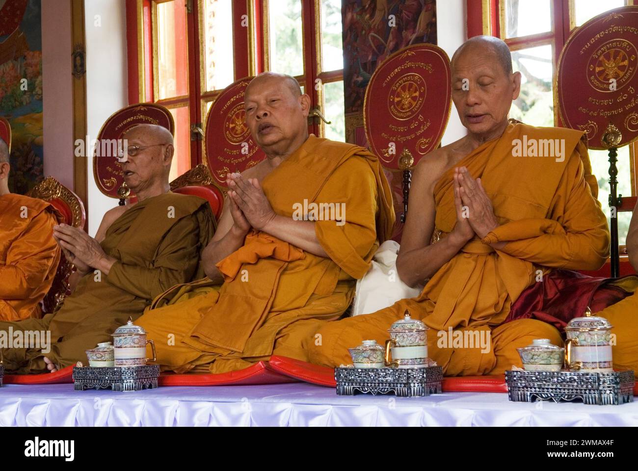 Buddhism UK. Buddhapadipa Temple in Wimbledon Buddhist monks praying London, England 24th June 2006. HOMER SYKES Stock Photo