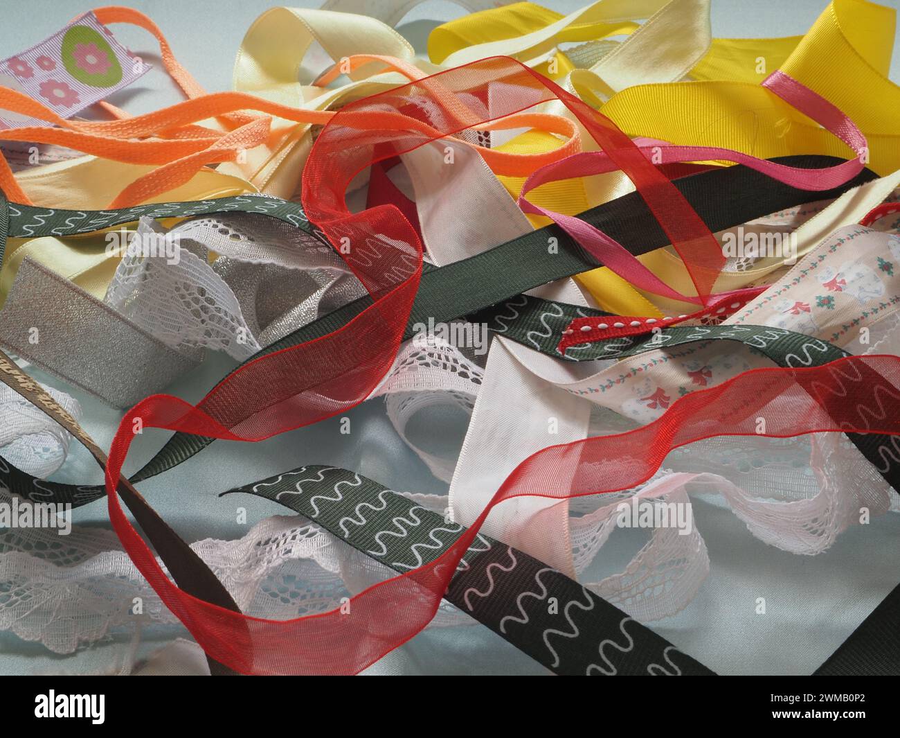 Selection Off Ribbon A selection of coloured ribbons scattered in a random fashion on a ...